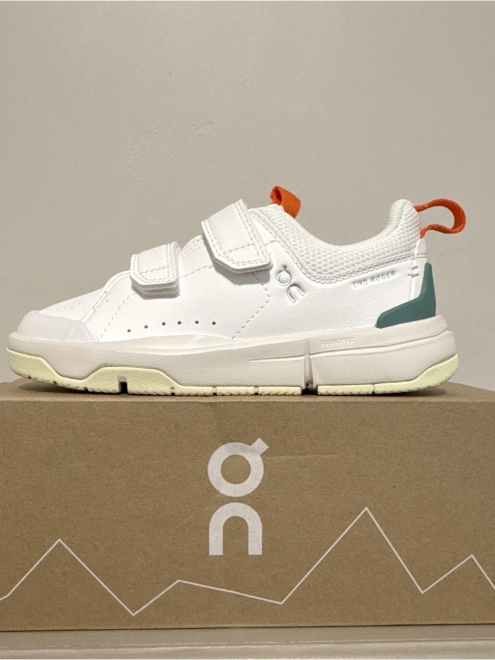 On Running Kids White Sneakers with Teal and Orange Accents